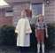 The day of my First Communion. That's my sister Kelly, burning with envy. The neighbor boy behind me is installing my halo.